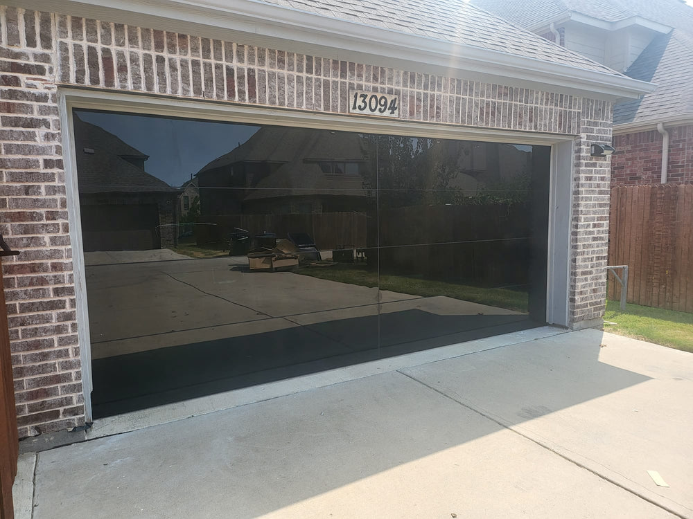 16 by 8 Full View Frameless Garage Door With Black Tinted Tempered Gla