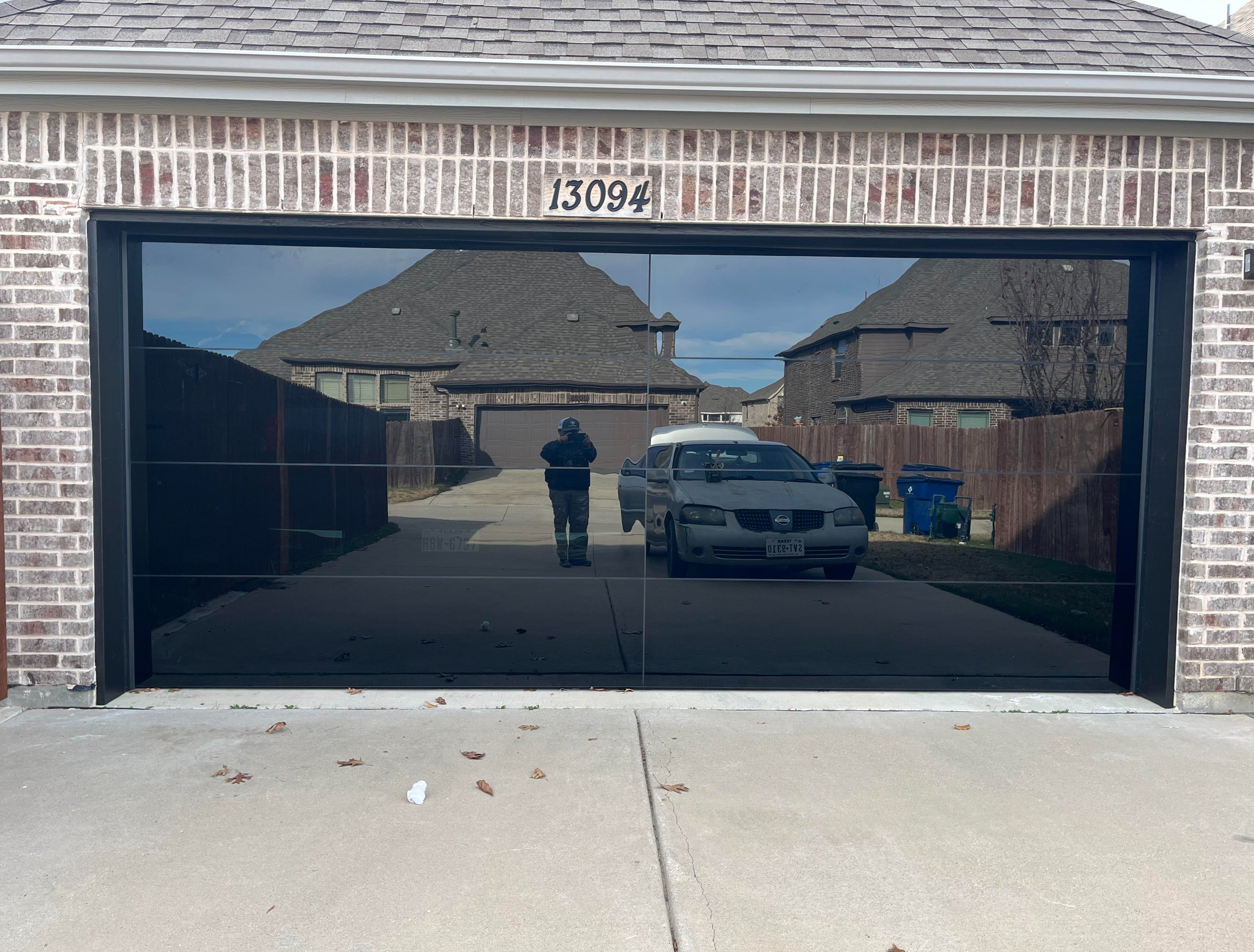18 by 8 Full View Frameless Garage Door With Black Tinted Tempered Gla